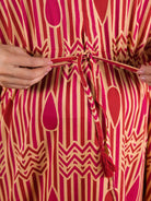 beige-maroon-geometric-print